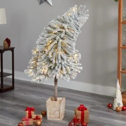 5' Winter Flocked Leaning Christmas Tree Pre-Lit 17 5' Winter Flocked Leaning Christmas Tree Pre-Lit -Artificial Flowers Sale artificial 5 winter flocked leaning tree pre lit with 150 led lights and 288 branches in decorative planter nearly natural 474139
