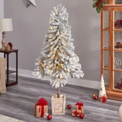 5' Winter Flocked Leaning Christmas Tree Pre-Lit 16 5' Winter Flocked Leaning Christmas Tree Pre-Lit -Artificial Flowers Sale artificial 5 winter flocked leaning tree pre lit with 150 led lights and 288 branches in decorative planter nearly natural 826611
